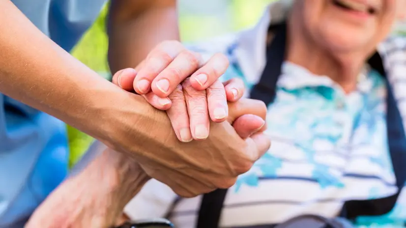 Una caregiver - © www.giornaledibrescia.it