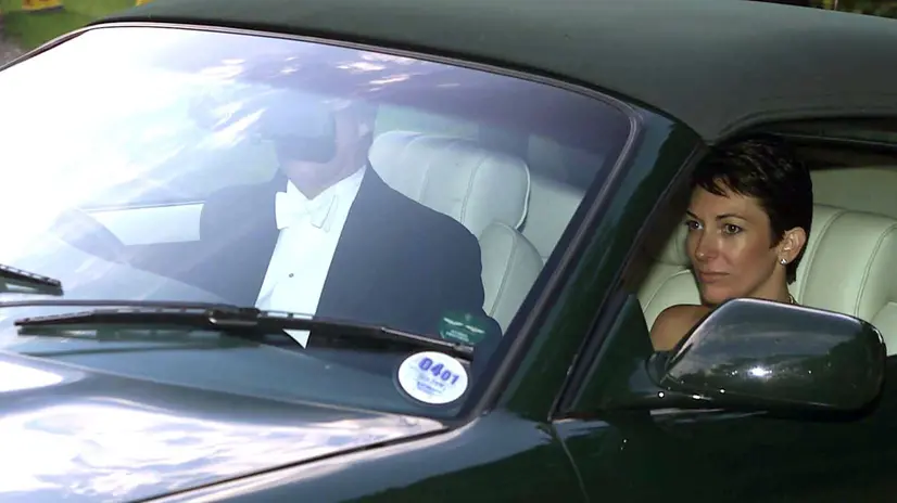 UK OUT NO MAGS NO SALES NO INTERNET NO ARCHIVES PAP57 - 20000902 - SALISBURY, UNITED KINGDOM : The Duke of York (L, behind wheel of car) leaves the wedding of a former girlfriend Aurelia Cecil to Rupert Stephenson at the Parish Church of St Michael in Compton Chamberlayne near Salisbury Saturday 2nd September, 2000. The Duke of York left after the service with Ghislaine Maxwell, the daughter of the late media mogul Robert Maxwell, pictured in passenger seat at right. UK OUT NO MAGS NO SALES NO INTERNET NO ARCHIVES EPA PHOTO PA/CHRIS ISON/CI/BW