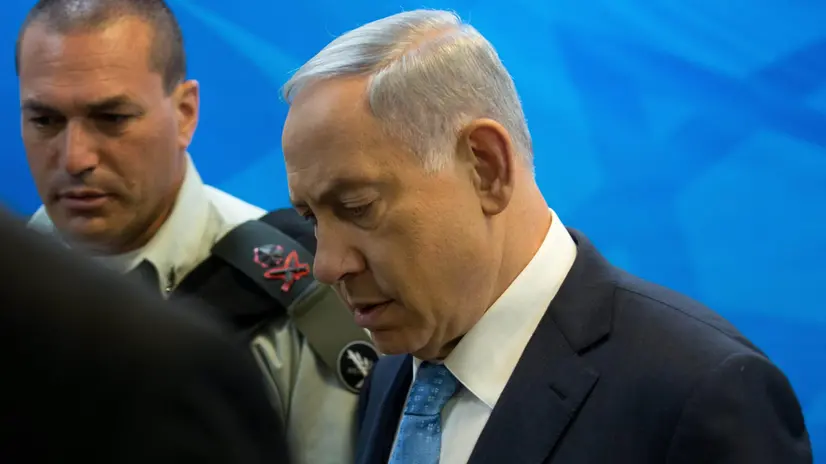 epa04711282 Israeli Prime Minister Benjamin Netanyahu (R) walks into the weekly cabinet meeting escorted by government military secretary Eyal Zamir (L) during the weekly cabinet meeting at his Jerusalem office, 19 April 2015. EPA/MENAHEM KAHANA / POOL