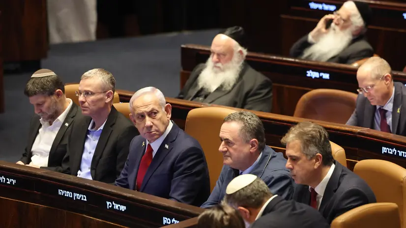 epa12255990 Israeli Prime Minister Benjamin Netanyahu (C) attends a plenary session to vote on a bill for applying Israeli sovereignty over the West Bank territory, at the Knesset, the Israeli parliament, in Jerusalem, 23 July 2025. The bill, submitted by the Religious Zionist Party, calls for the imposition of Israeli sovereignty over the occupied West Bank, and the use of 'Judea and Samaria' instead of West Bank in Israel's legislation. EPA/ABIR SULTAN