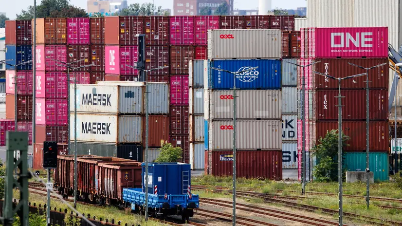 epa12288001 Transshipment containers are seen at the Westhafen container terminal in Berlin, Germany, 07 August 2025. New US tariffs on more than 60 countries came into force on 07 August, with 15 percent surcharge applies to most products from the EU. Special duties of 50 percent remain in place for steel and aluminum imports. EPA/CLEMENS BILAN