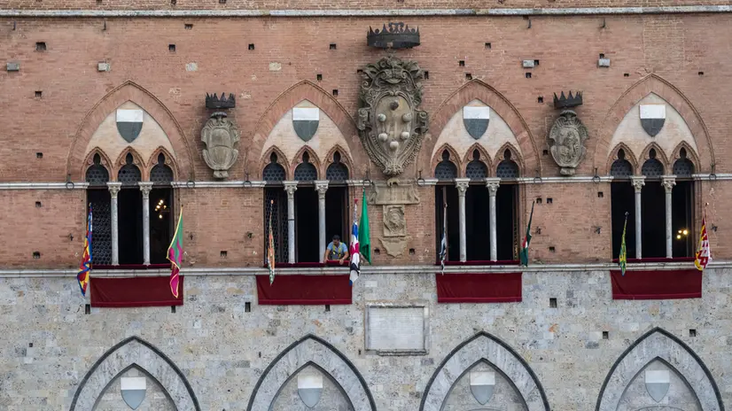 Spectators leave after the announcement that the historical horse race 'Palio di Siena' has been postponed to 03 July due to the rain in Siena, Italy, 02 July 2025. The traditional horse races between 17 Siena city districts called takes place on 02 July as the 'Palio di Provenzano' on the holiday of the Madonna of Provenzano and on 16 August 2025 as the 'Palio dell'Assunta' on the holiday of the Virgin Mary. ANSA/CLAUDIO GIOVANNINI