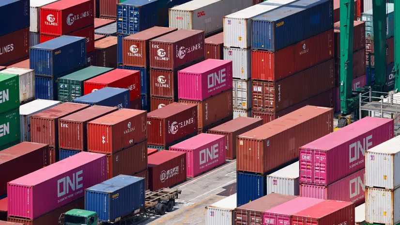epa12287710 Shipping containers are being moved at the port in Keelung City, Taiwan, 07 August 2025. On 06 August, U.S. President Donald Trump announced that the United States intends to impose a tariff of approximately 100 percent on imported semiconductor chips, with exemptions for companies that are building or have committed to building manufacturing facilities in the United States. Taiwan, as the home of the world-leading chipmaker Taiwan Semiconductor Manufacturing Co. (TSMC), is a significant player in the global supply chain for semiconductors, which are essential for products ranging from smartphones and cars to military equipment. EPA/RITCHIE B. TONGO