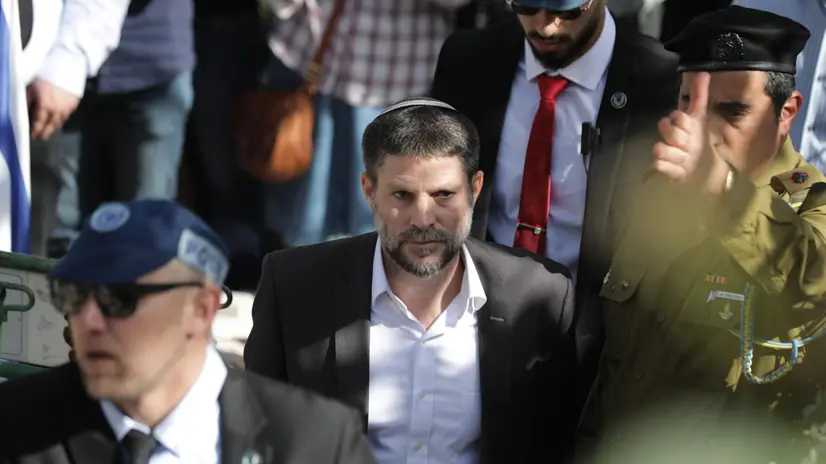 epa10493694 Israeli Finance Minister Bezalel Smotrich attends the funeral of two Israeli brothers Hillel and Yagel Yaniv at the Mount Herzl military cemetery in Jerusalem, 27 February 2023. Hillel and Yagel Yaniv were shot dead by a Palestinian driver on 26 February, as Israeli authorities said, near the Palestinian village of Hawara close to the city of Nablus in the West Bank. EPA/ABIR SULTAN