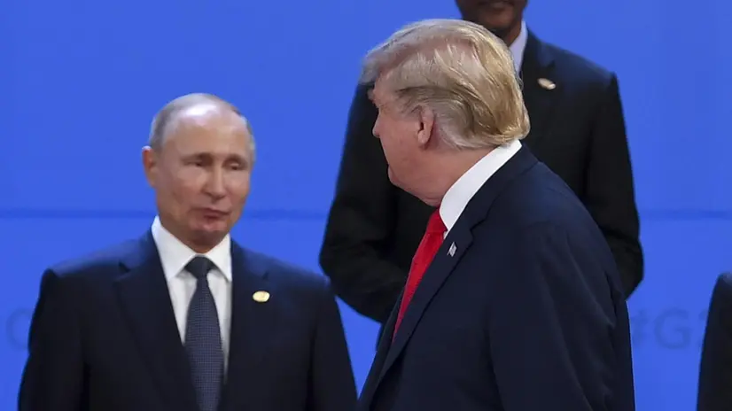epa07200663 US President Donald Trump (front) walks past Crown Prince of Saudi Arabia Mohammad Bin Salman Al Saud (top right) President of Brazil Michel Temer (right), President of Russia Vladimir Putin ahead of the family picture at the G20 summit in Buenos Aires, Argentina, 30 November 2018. The Group of Twenty (G20) Summit brings together the heads of State or Government of the 20 largest economies and takes place from 30 November to 01 December 2018. EPA/LUKAS COCH AUSTRALIA AND NEW ZEALAND OUT