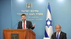 epa10400403 Israel's Prime Minister Benjamin Netanyahu (R) and Finance Minister Bezalel Smotrich (L) hold a press conference at the prime minister's office in Jerusalem, Israel, 11 January 2023. EPA/ABIR SULTAN