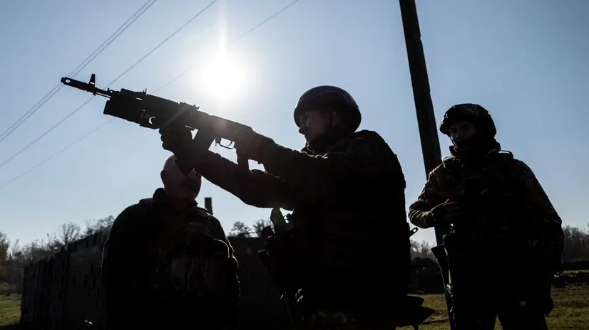 epa10921958 A Ukrainian serviceman from the 'Donbas' battalion inspects a rifle as they take part in military training at a position near the frontline, Donetsk region, eastern Ukraine, 16 October 2023, amid the Russian invasion. Russian troops entered Ukrainian territory in February 2022, starting a conflict that has provoked destruction and a humanitarian crisis. EPA/YAKIV LIASHENKO