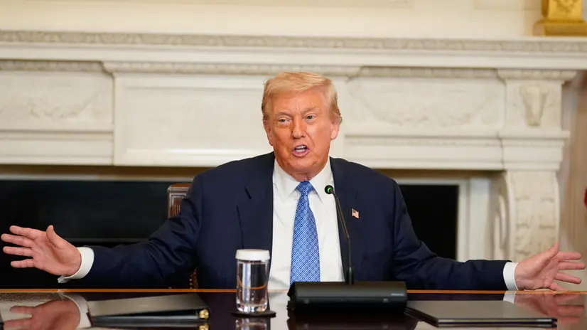 epa12290511 US President Donald Trump attends a signing ceremony in the State Dining Room of the White House in Washington, DC, USA, 08 August 2025. US President Trump said he would host the leaders of Armenia and Azerbaijan for a peace summit with the expectation that the pair will sign an agreement seeking to end decades of conflict between the South Caucasus nations. EPA/NATHAN HOWARD / POOL
