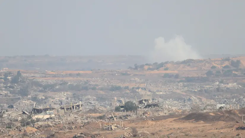 epa12294744 Destroyed buildings inside Gaza, as seen from the Israeli side, near the border with Gaza Strip, in southern Israel, 12 August 2025. Over 61,400 Palestinians have been killed in the Gaza Strip since October 2023, according to the Palestinian Ministry of Health, and about 1,200 Israelis have been killed since the launch of an Israeli military campaign in response to a cross-border attack by Hamas on 07 October 2023 EPA/ABIR SULTAN