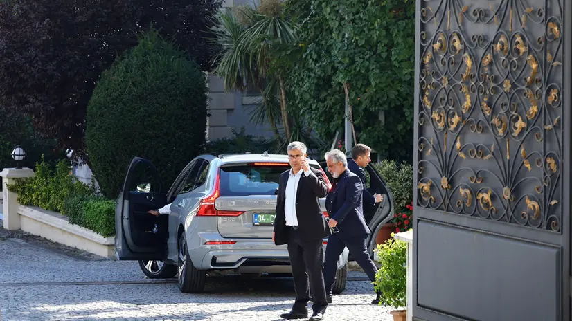 epa12260561 A staff member guards the gate of the Iranian Consulate as a European delegation arrives ahead of nuclear talks, in Istanbul, Turkey, 25 July 2025. According to the Iranian Foreign Ministry spokesperson, Iran is set to hold nuclear talks with representatives from Britain, France and Germany in Istanbul on 25 July. EPA/TOLGA BOZOGLU