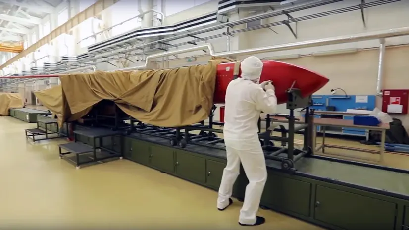 epa06898140 A handout still image from a video footage made available 19 July 2018 by the Russian Defense Ministry on its official Youtube page shows the Russian specialist near the Burevestnik nuclear powered cruise missile in a plant in Russia. EPA/RUSSIAN DEFENCE MINISTRY PRESS SERVICE / HANDOUT HANDOUT EDITORIAL USE ONLY/NO SALES