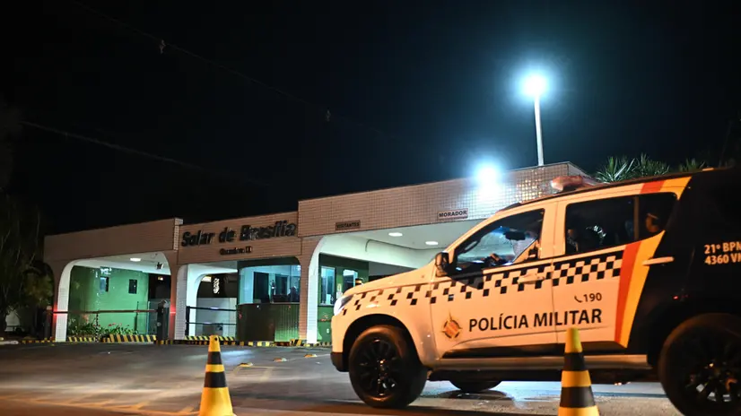 epa12283623 A Brazilian Military Police vehicle is seen outside the entrance to the condominium where former Brazilian President Jair Bolsonaro lives in Brasilia, Brazil, 04 August 2025. The Brazilian Supreme Court ordered Bolsonaro's house arrest for violating some of the precautionary restrictions imposed on him due to flight risk, as part of his trial for coup plotting. EPA/Andre Borges