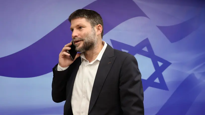 epa10504350 Israeli Minister of Finance and leader of the Religious Zionist Party, Bezalel Smotrich, arrives to attend the weekly cabinet meeting at the prime minister's office in Jerusalem, 05 March 2023. EPA/GIL COHEN-MAGEN / POOL