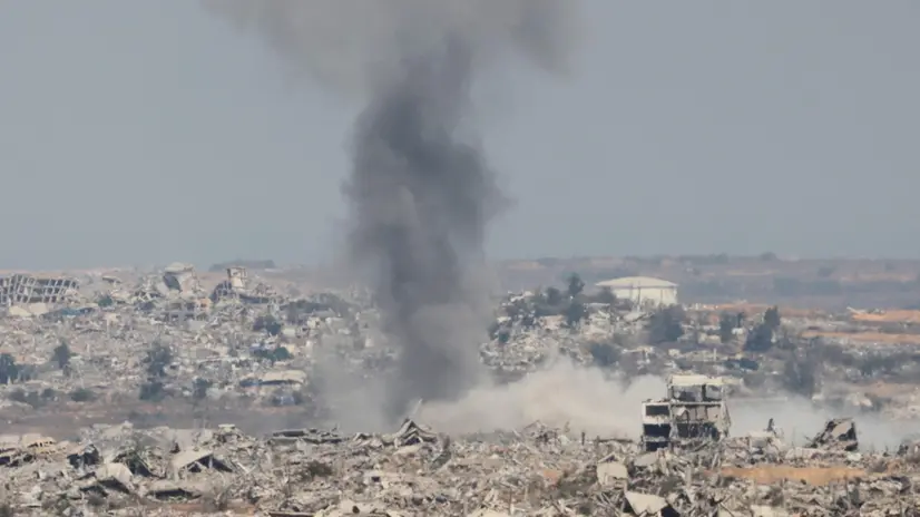 epa12294746 Smoke rises from destroyed buildings following an Israeli airstrike inside Gaza, as seen from the Israeli side, near the border with Gaza Strip, in southern Israel, 12 August 2025. Over 61,400 Palestinians have been killed in the Gaza Strip since October 2023, according to the Palestinian Ministry of Health, and about 1,200 Israelis have been killed since the launch of an Israeli military campaign in response to a cross-border attack by Hamas on 07 October 2023 EPA/ABIR SULTAN