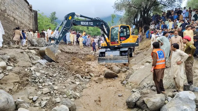 epa12301663 Volunteers and rescue officials search the rubble after a cloudburst in Bajaur, Pakistan, 15 August 2025. At least 8 people were killed and several injured after a cloudburst triggered a flash flood in Salarzai's Jabrarai village. EPA/HANIFULLAH KHAN