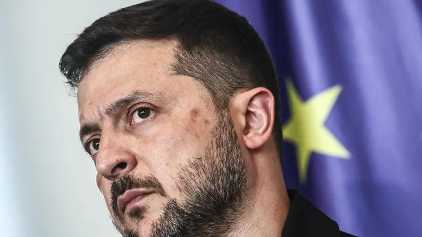 epa12297935 Ukrainian President Volodymyr Zelensky attends a press conference with German Chancellor Merz (unseen) after a video call with other heads of state ahead of a summit between the US and Russian leaders, in Berlin, Germany, 12 August 2025 EPA/FILIP SINGER