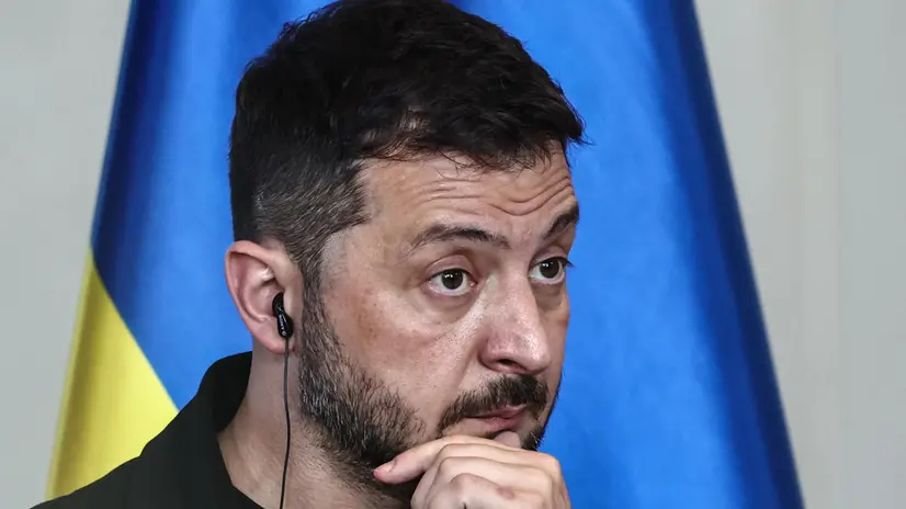 epa12297929 Ukrainian President Volodymyr Zelensky attends a press conference with German Chancellor Merz (unseen) after a video call with other heads of state ahead of a summit between the US and Russian leaders, in Berlin, Germany, 12 August 2025 EPA/FILIP SINGER