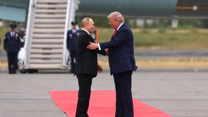 epa12303476 US President Donald Trump (R) welcomes Russian President Vladimir Putin, as they meet to negotiate at Joint Base Elmendorf-Richardson in Anchorage, Alaska, USA, 15 August 2025. EPA/GAVRIIL GRIGOROV/SPUTNIK/KREMLIN POOL / POOL MANDATORY CREDIT