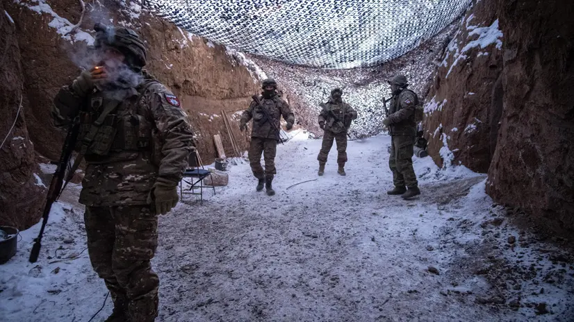 epa11905248 Members of the Joint Assault Brigade 'Lyut' of the Ukrainian National Police await orders at their artillery position on the Toretsk front line, Donbas, Ukraine, 18 February 2025. At this position they operate a self-propelled howitzer 2S22 Bohdana (Ukrainian for Given by God) which has a range of up to 42 kilometers and uses 155-millimeter ammunition, making it one of the most valuable pieces the Ukrainian artillery has at the moment. In one day they can fire its cannon between 20 and 40 times. EPA/Maria Senovilla