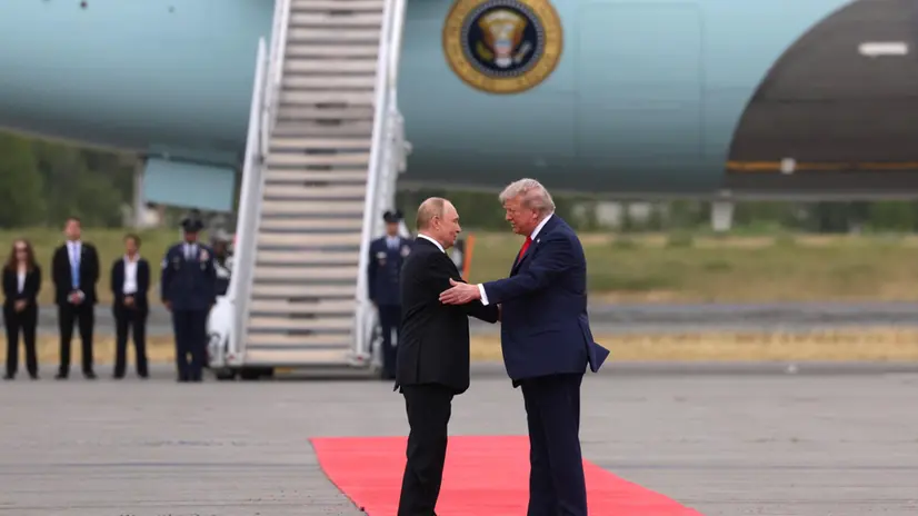 epa12303477 US President Donald Trump (R) welcomes Russian President Vladimir Putin, as they meet to negotiate at Joint Base Elmendorf-Richardson in Anchorage, Alaska, USA, 15 August 2025. EPA/GAVRIIL GRIGOROV/SPUTNIK/KREMLIN POOL / POOL MANDATORY CREDIT