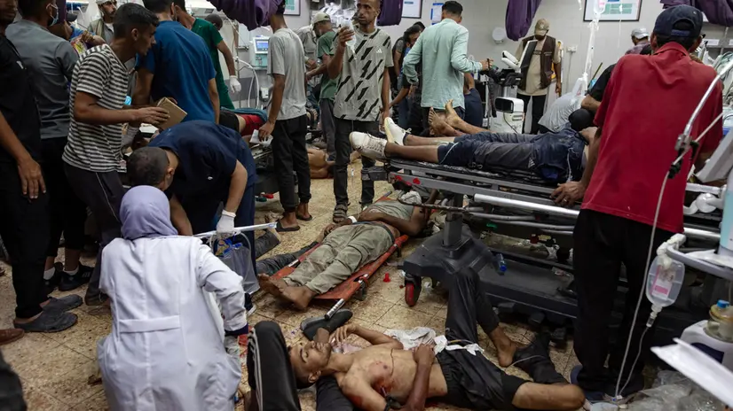 epa12284568 GRAPHIC CONTENT - Wounded Palestinians are treated at Nasser Hospital in Khan Younis, Gaza Strip, 05 August 2025. According to the hospital, hundreds of patients were being treated following Israeli bombardements on a near-by area. EPA/HAITHAM IMAD -- ATTENTION EDITORS: GRAPHIC CONTENT --
