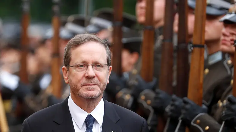 epa12284111 Israeli President Isaac Herzog attends an official ceremony, welcomed by Latvian President Edgars Rinkevics (not pictured), in Riga, Latvia, 05 August 2025. Herzog is on an official visit to Latvia. In addition to Latvia, he is also visiting Lithuania and Estonia. The visit aims to strengthen ties, promote hostage diplomacy, and honor the memory of the Holocaust across the Baltic states. EPA/TOMS KALNINS