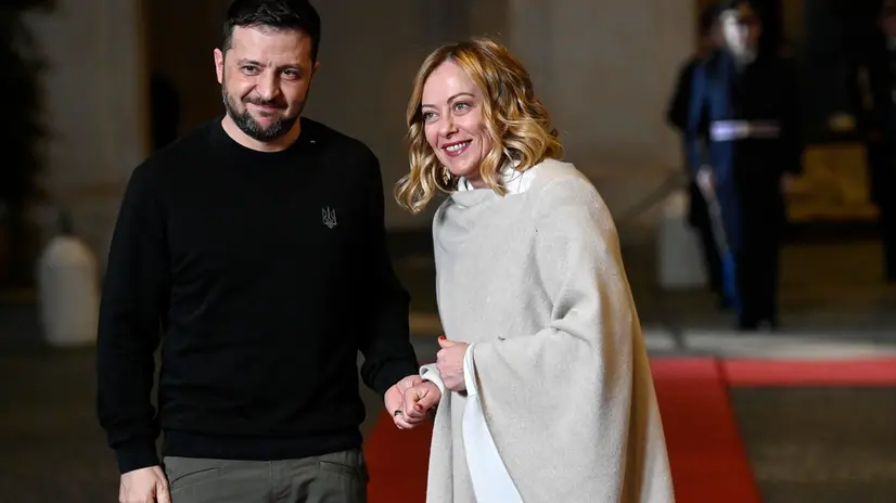 epa11815577 Italian Prime Minister Giorgia Meloni (R) welcomes Ukrainian President Volodymyr Zelensky (L) ahead of their talks at Palazzo Chigi, Rome, Italy, 09 January 2025.Â EPA/RICCARDO ANTIMIANI