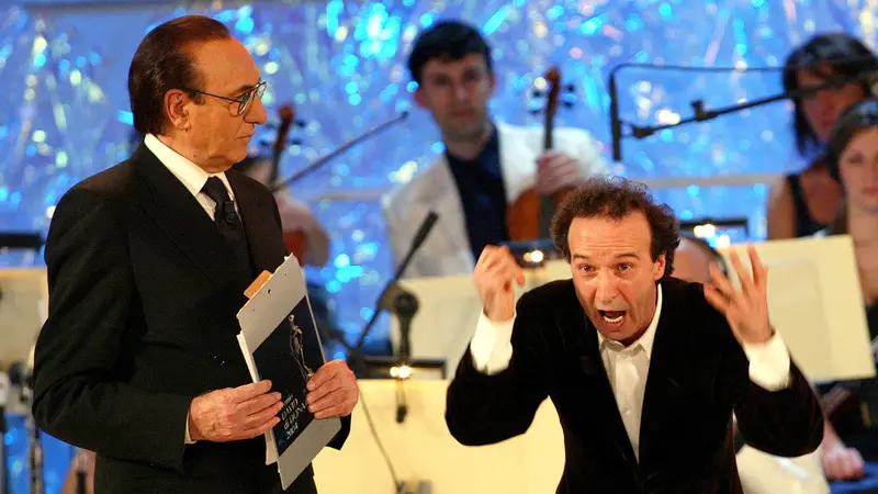 Pippo Baudo con Roberto Benigni - Ansa © www.giornaledibrescia.it