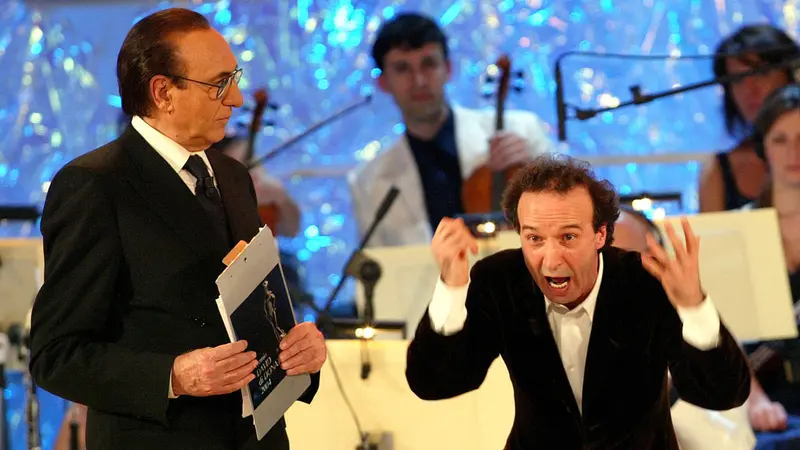 Pippo Baudo con Roberto Benigni - Foto Ansa © www.giornaledibrescia.it