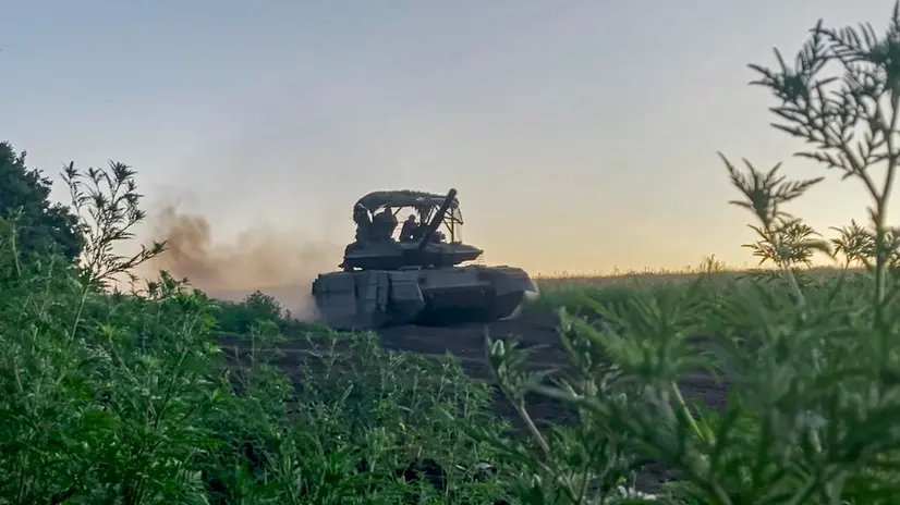 epa11547784 A still image taken from handout video provided by the Russian Defence Ministry shows a T-90M Proryv tank of the 1st Guards Tank Army of the West Group of Forces firing in action in the Luhansk region, Ukraine, 13 August 2024. EPA/RUSSIAN DEFENCE MINISTRY PRESS SERVICE/HANDOUT HANDOUT HANDOUT EDITORIAL USE ONLY/NO SALESHANDOUT EDITORIAL USE ONLY/NO SALES