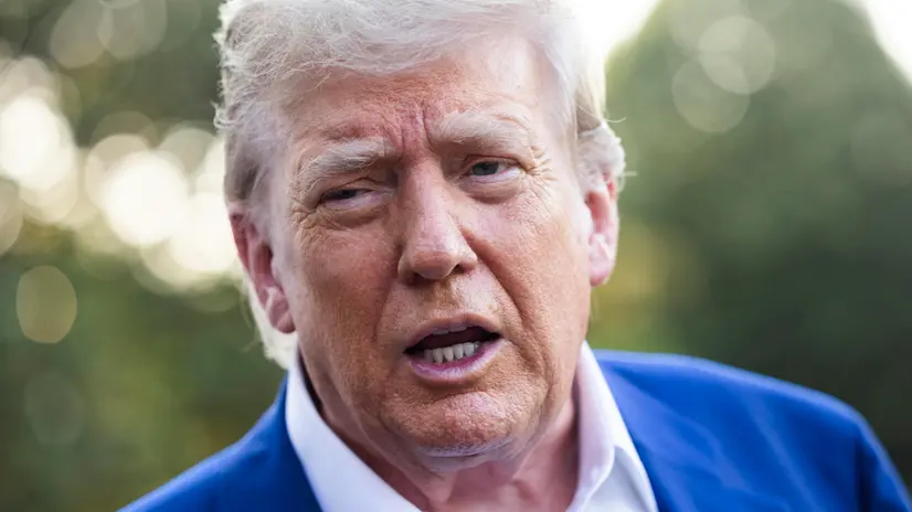epa12194383 US President Donald Trump speaks to the media as he departs the White House for the NATO leaders summit, in Washington, DC, USA, 24 June 2025. The president answered questions about accusations of ceasefire violations in the Iran-Israel conflict. EPA/JIM LO SCALZO
