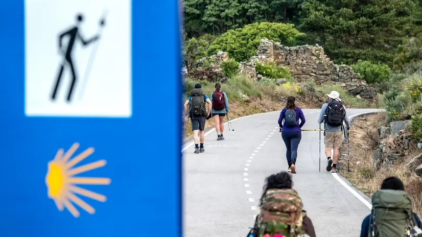 epa10758028 Pilgrims walk the St James Way in Manjarin, Leon, Spain, 04 June 2023. The St James Way, also known as the ‘Way of Saint James’ is one of the most ancient and popular pilgrimage routes in the world since the XI century. Often referred to as the Camino de Santiago, this Way takes pilgrims through many different routes across Spain, France and Portugal and culminates in the city of Santiago de Compostela. EPA/CRISTOBAL HERRERA-ULASHKEVICH ATTENTION: This Image is part of a PHOTO SET