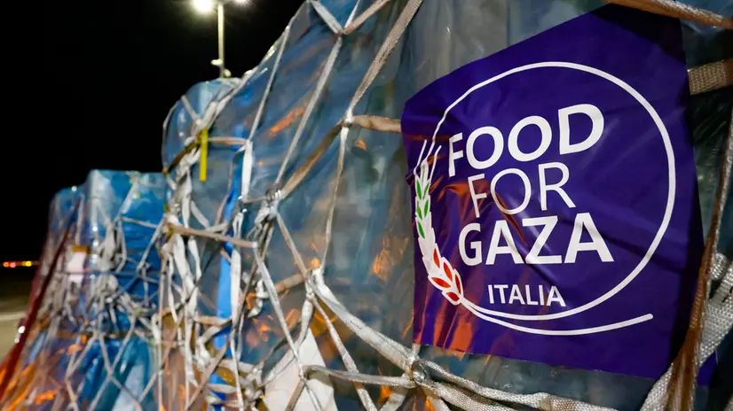 Boxes with humanitarian aid of 'Food for Gaza' initiative is prepared for shipment in a transport aircraft at Fiumicino Airport, in Rome, Italy, 8 August 2025. ANSA/FABIO FRUSTACI