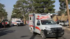 epa10912556 Ambulances drive along a street to help injured victims after another earthquake hit Herat, Afghanistan, 11 October 2023. A 6.3-magnitude earthquake and the consecutive aftershocks that struck western Afghanistan during the weekend killed nearly 3,000, according to estimates by the government and nonprofit organizations. Over 2,000 people were wounded and 20 villages completely destroyed in the tremors. EPA/SAMIULLAH POPAL =