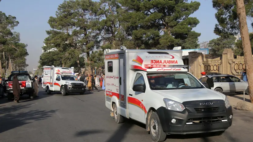 epa10912556 Ambulances drive along a street to help injured victims after another earthquake hit Herat, Afghanistan, 11 October 2023. A 6.3-magnitude earthquake and the consecutive aftershocks that struck western Afghanistan during the weekend killed nearly 3,000, according to estimates by the government and nonprofit organizations. Over 2,000 people were wounded and 20 villages completely destroyed in the tremors. EPA/SAMIULLAH POPAL =