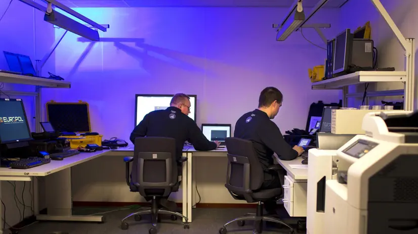 epa03531200 Employees of the European Cybercrime Centre (EC3) work at their places in The Hague, The Netherlands, 11 January 2013. The EC3 is hosted by Europol, the European law enforcement agency in The Hague. The center was opened 11 January and will be - according to the EC3's website - 'the focal point in the EU's fight against cybercrime, contributing to faster reactions in the event of online crimes'. EPA/ILVY NJIOKIKTJIEN