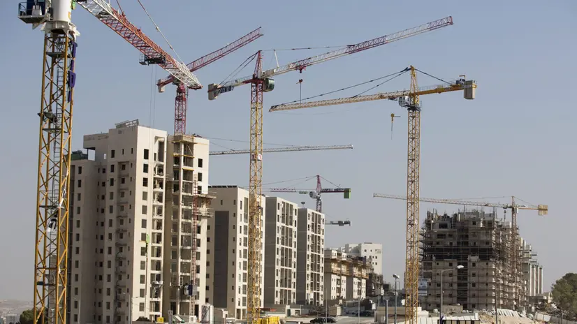 epa05450137 A view on a new construction site in the south Jerusalem neighborhood of Har Homa, Israel, 31 July 2016. According to the Israeli left-wing organization Peace Now, announced goverment initiative to confirm a plan to build some new housing units in East Jerusalem; 130 apartments in Har Homa, 89 in Gilo neighborhood and 68 in Pisgat Zeev. EPA/ABIR SULTAN