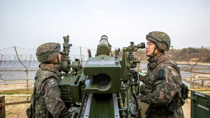 epa12038067 An undated handout photo made available by the Republic of Korea Army shows soldiers preparing to fire a K105A1 wheeled self-propelled howitzer toward the sea off Goseong, Gangwon Province, northeastern South Korea (issued 18 April 2025), as the Army's 22nd Infantry Division conducts a two-day nighttime live-fire drill from 16 April 2025. EPA/ROK ARMY / HANDOUT SOUTH KOREA OUTHANDOUT EDITORIAL USE ONLY/NO SALES