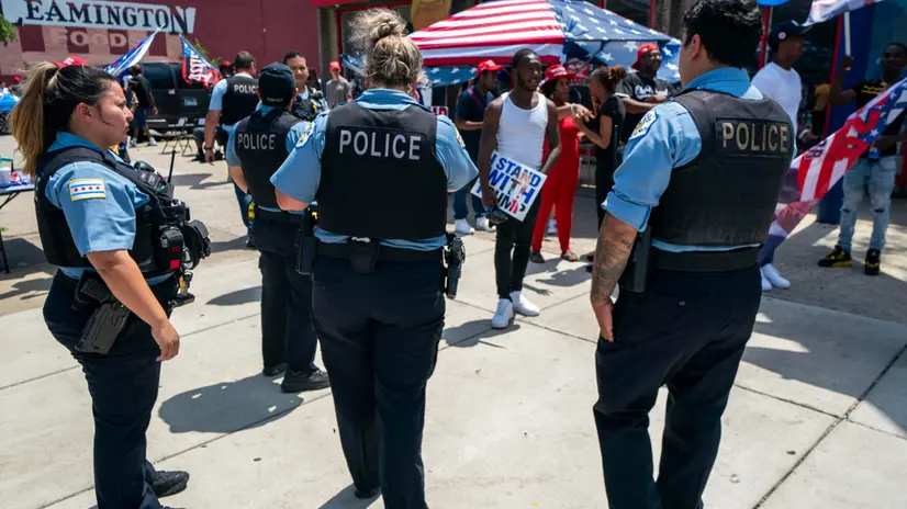 epa11478427 Police arrive as supporters of former President Donald J. Trump participate in a small Trump Unity Rally in Chicago, Illinois, USA, 14 July 2024. Trump was injured by a bullet in an assassination attempt on 13 July during a campaign rally in Butler, Pennsylvania. EPA/SHAWN THEW