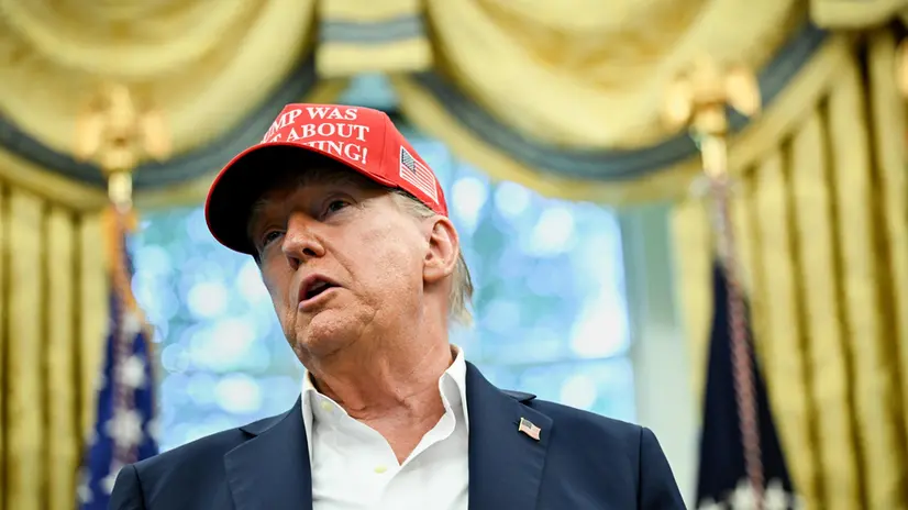 epa12317171 US President Donald Trump announces the 2026 FIFA World Cup draw will be held at the Kennedy Center in December 2025, in the Oval Office of the White House in Washington, DC, USA, 22 August 2025. The 2026 FIFA World Cup, coming to North America next summer will be the first World Cup with three host countries in the U.S., Canada and Mexico, and it will be the first to feature a 48-team field. EPA/ANNABELLE GORDON / POOL