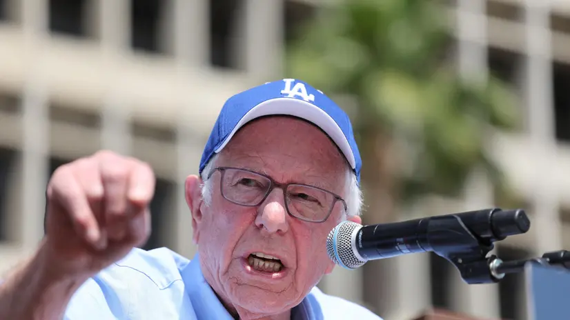epa12028276 US Senator Bernie Sanders delivers a speech during the 'Fighting Oligarchy Tour' rally at Grand Park in Los Angeles, California, USA, 12 April 2025. Thousands of people attended the rally, at which music artists Neil Young and Joan Baez performed. EPA/DAVID SWANSON