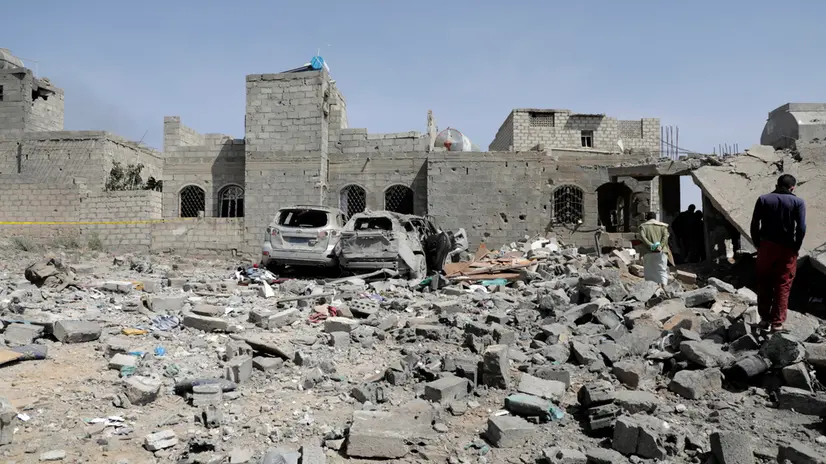 epa12015451 People inspect a damaged building after a US airstrike in Sana'a, Yemen, 07 April 2025. According to the Ministry of Health in the Houthi-administrated Sana'a, at least four were killed and 25 injured in a US airstrike on a residential building in the Sha'ub district on 06 April. EPA/OSAMAH YAHYA