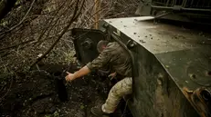 epa12255492 A handout photo made available by the press service of the 24th Mechanized Brigade of Ukrainian Armed Forces on 23 July 2025 shows servicemen of the 24th Mechanized Brigade named after King Danylo fire a 122mm howitzer 2S1 outskirts of Chasiv Yar in Donetsk region, Ukraine, 22 July 2025, amid the ongoing Russian invasion. EPA/Press service of the 24th Mechanized brigade HANDOUT HANDOUT EDITORIAL USE ONLY/NO SALES