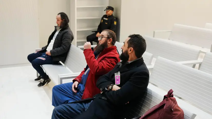 epa11096046 Mohamed El Gharbi, Karim Abdeselam Mohamed and Abdelah Abdeselam Ahmed sit in the dock during their trial at Spain's National Court in Madrid, central Spain, 22 January 2024. The prosecutor's office is seeking up to 12 years in prison for the crime of forming a terrorist group, although it has proposed a subsidiary sentence of eight years for collaboration with a terrorist organization or terrorist recruitment and indoctrination. The defendants were previously acquitted twice of forming an alleged prison front in the prisons where they were serving sentences for terrorism, with the aim of indoctrinating other inmates, and from which the main defendant, Mohamed Acraf, is on the run. EPA/BORJA SANCHEZ TRILLO / POOL