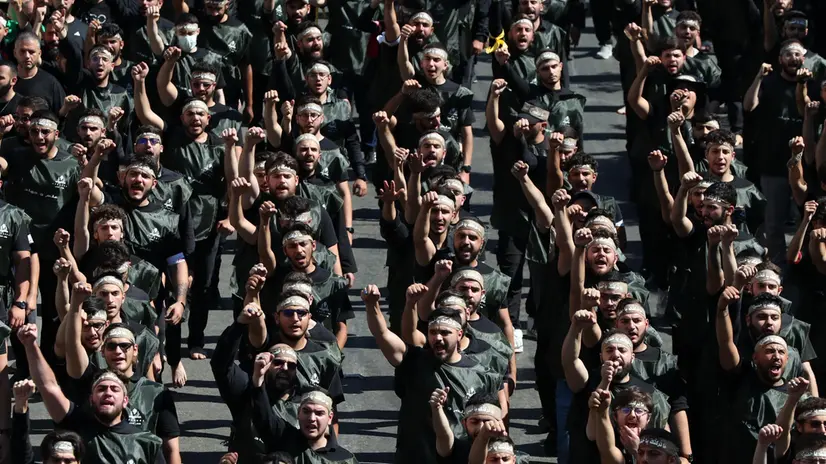 epa12219636 Hezbollah supporters gather to celebrate Ashura Day in southern Beirut, Lebanon, 06 July 2025. Shiite Muslims across the world are observing the holy month of Muharram, the first month of the Islamic calendar, which culminates with the celebration of the Ashura, commemorating the martyrdom of Imam Hussein, a grandson of the Prophet Muhammad. EPA/WAEL HAMZEH