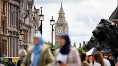 epa12164162 Visitiors and members of Muslim community attend the Mayor of London's 'Eid on the Square' event with the Elizabeth Tower, which is commonly known as Big Ben, in the background, to mark Eid al-Adha in Trafalgar Square, London, Britain, 08 June 2025. The free and family-friendly festival brings together a variety of cultures, food, entertainment and art of Islam religion and celebrates Eid al-Adha. EPA/TOLGA AKMEN
