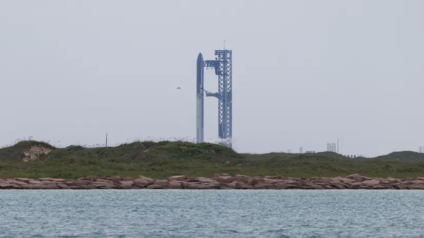 epa12322760 SpaceX’s Starship rocket as seen from Isla Blanca Park on South Padre Island, Texas, USA, 25 August 2025. The launch of SpaceX’s Starship, the largest and most powerful rocket ever built, was called off for the second day in a row due to inclement weather near the Starbase facility. EPA/MICHAEL GONZALEZ