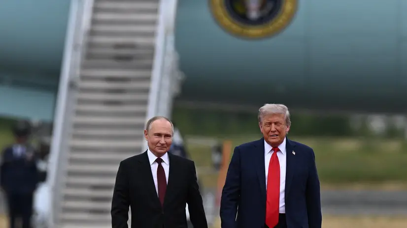 epa12303497 US President Donald Trump (R) welcomes Russian President Vladimir Putin, as they meet to negotiate at Joint Base Elmendorf-Richardson in Anchorage, Alaska, USA, 15 August 2025. EPA/SERGEY BOBYLEV/SPUTNIK/KREMLIN POOL MANDATORY CREDIT