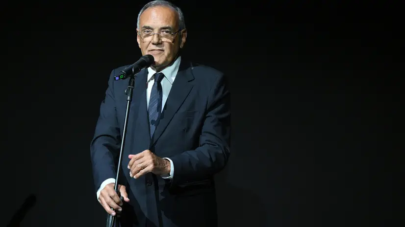 epa12324442 Festival Director Alberto Barbera speaks at the pre-opening event before the screening of the short film 'Origin', by Yann Arthus-Bertrand at the Lido Beach for the 82nd annual Venice International Film Festival, in Venice, Italy, 26 August 2025. The film festival runs from 27 August to 06 September 2025. EPA/ETTORE FERRARI