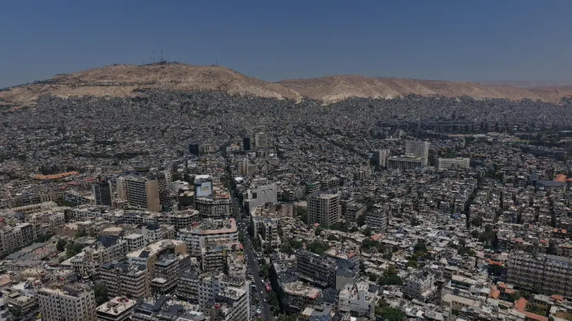 epa12242603 Aerial view of Damascus, Syria, 17 July 2025, a day after an Israeli airstrike on the Syrian Ministry of Defence building, following the deployment of Syrian troops in the predominantly Druze province of Suwayda (Sweida), after clashes between Druze fighters and Bedouin tribes resulted in the death of dozens of people. EPA/AHMAD FALLAHA
